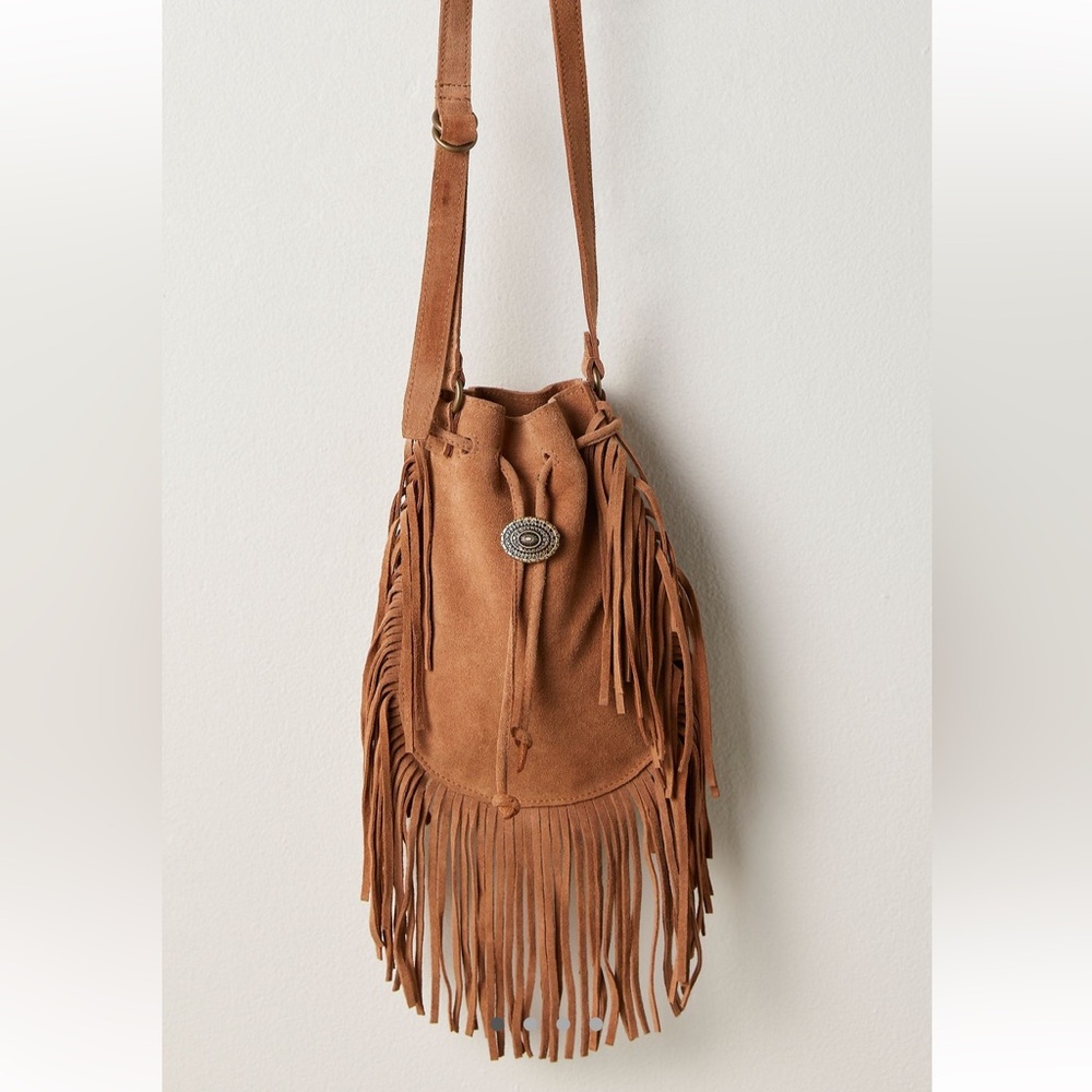 Free People Calamity crossbody Tan Fringe Shoulder Bag
Never used. 
Super cute 🌸